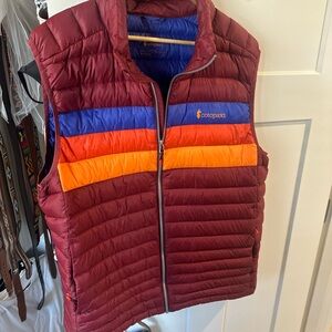 Cotopaxi Burgundy Vest with Blue and Orange Accents